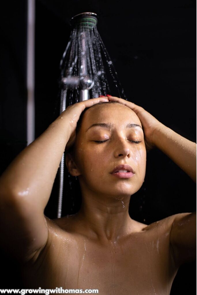 a-woman-taking-a-relaxing-evening-shower