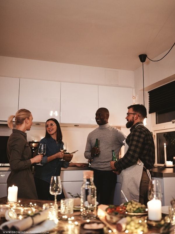 Friends-having-drinks-and-cocktail-in-a-drink-station-during-a-holiday.
