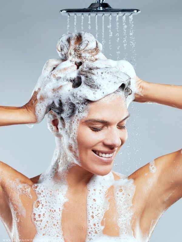 a-woman-washing-hair-with-shampoo