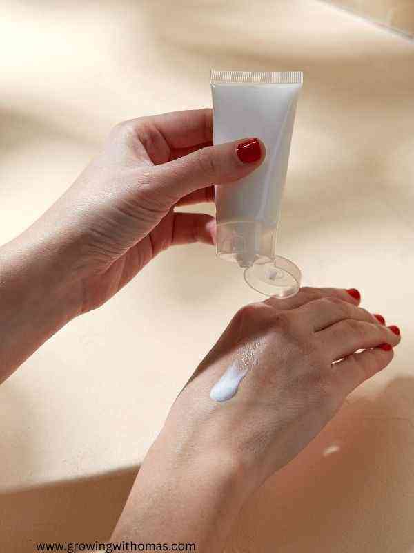 a-womman-applying-hand-cream-on-how-to-moisturize-dry-hands-naturally-