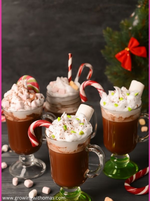 A-Christmas-coffee-or-hot-chocolate-station-with-mugs-marshmallows-candy-canes-and-festive-decorations