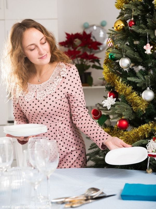 A-woman-preparing-her-new-years-eve-hosting-ideas-home-for-new-years-hosting.