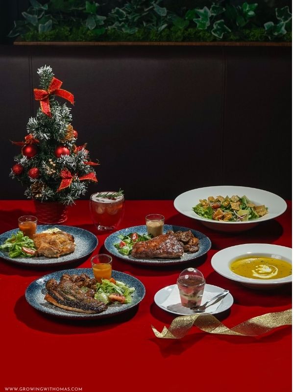 Beautiful-Christmas-dinner-table-with-different-plate-of-meals