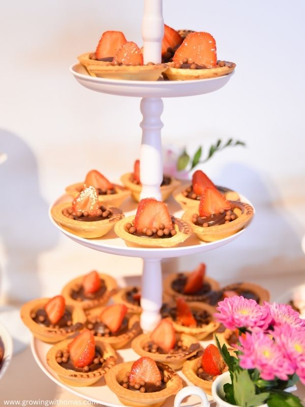 Dessert-table-with-cupcakes-cookies-and-pastries-for-New-Years-Eve