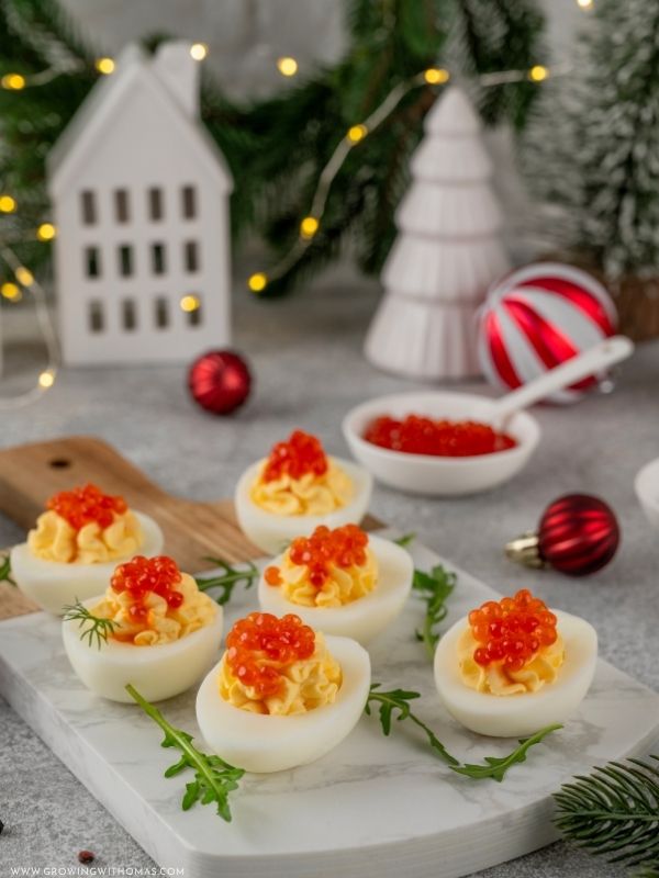 Deviled-eggs-arranged-on-a-festive-Christmas-platter